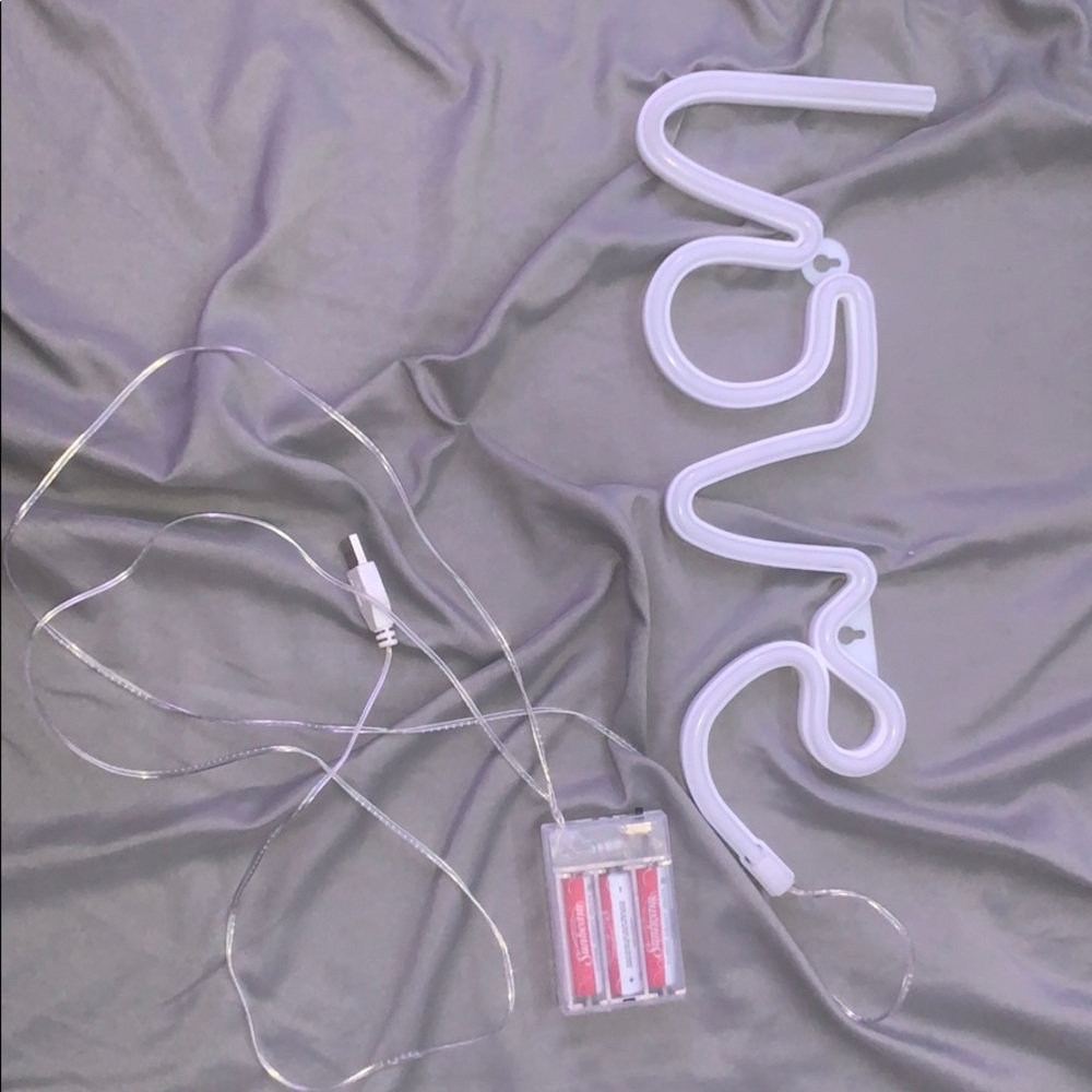 Hot pink “love” LED sign